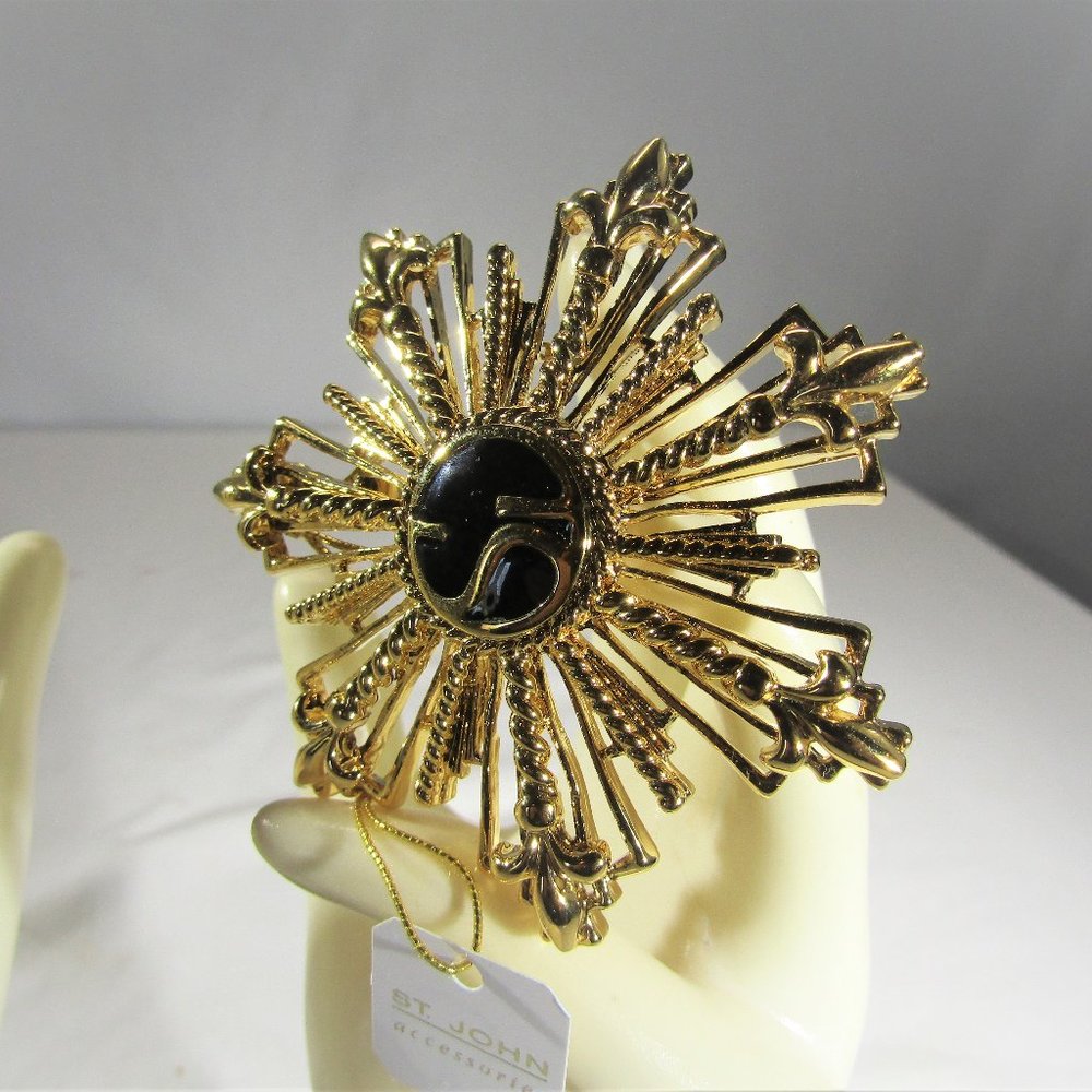 St. John Gold Starburst Brooch with Black Center